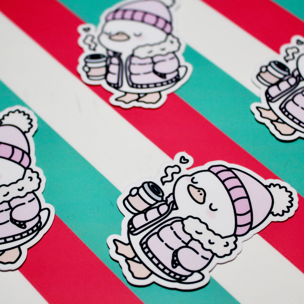 Cute Winter Duck Pink Coat Sticker – Cozy Duck in Puffer Coat – Hot Drink Duck Vinyl Sticker – Waterproof Glossy Sticker – Pastel Winter Aesthetic – 3.76cm x 5.48cm