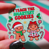 Load image into Gallery viewer, Teach the Smartest Cookies Sticker – Cute Teacher Christmas Sticker – Gingerbread Teacher Gift – Waterproof Vinyl Sticker – 4.88cm x 4.9cm
