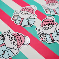 Load image into Gallery viewer, Cozy Santa Blue Coat Sticker – Cute Christmas Santa Vinyl Sticker – Hot Drink Santa – Glossy Waterproof Sticker – Festive Sticker – 5.29cm x 6.18cm
