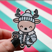 Load image into Gallery viewer, Cozy Winter Deer Closed Eyes Sticker – Cute Reindeer Vinyl Sticker – Hot Drink Deer – Glossy Waterproof Sticker – Christmas Aesthetic – 4.32cm x 6.03cm

