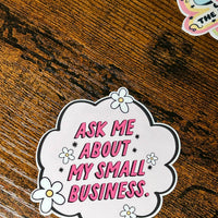 Load image into Gallery viewer, Sticker with 'Ask me about my small business' text on a wooden surface
