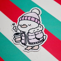 Load image into Gallery viewer, Cute Winter Duck Pink Coat Sticker – Cozy Duck in Puffer Coat – Hot Drink Duck Vinyl Sticker – Waterproof Glossy Sticker – Pastel Winter Aesthetic – 3.76cm x 5.48cm
