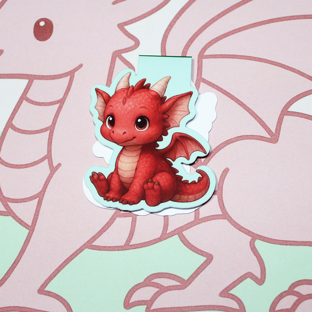 Magnetic bookmark of a red dragon on a pink and green background