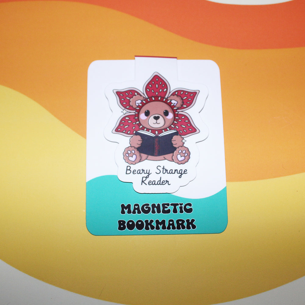 Magnetic bookmark with a bear design on a colorful background