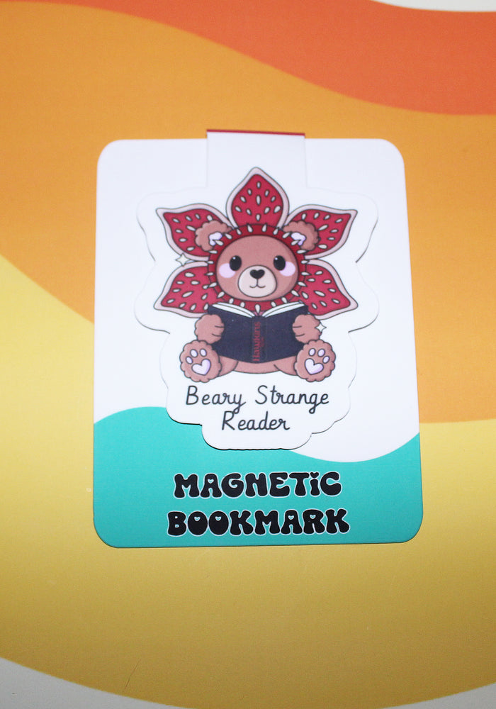 Magnetic bookmark with a bear design on a colorful background