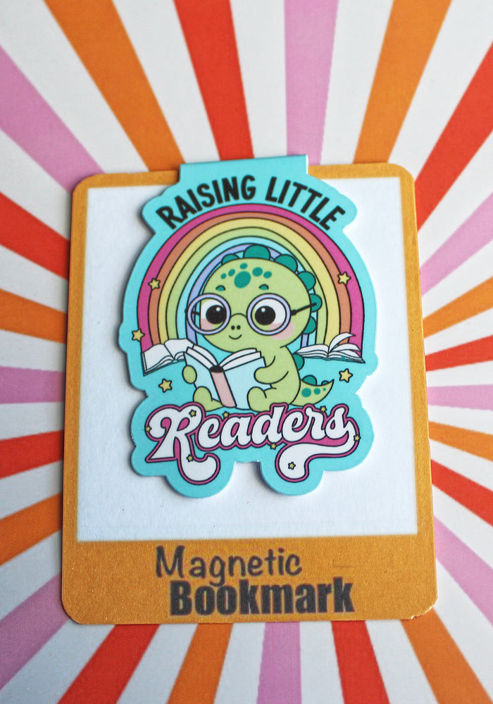 Magnetic bookmark with a cartoon character holding a rainbow and text on a colorful striped background