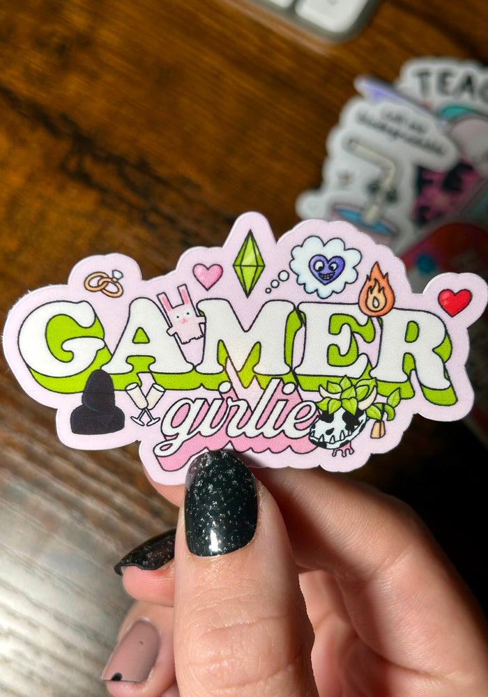 text; Gamer girlie sticker, including images inspired from The Sims 