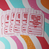 Load image into Gallery viewer, Set of gift tags with humorous text on a colorful abstract background
