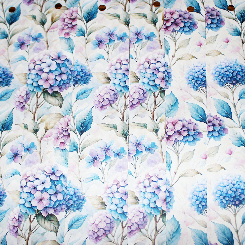Pattern of blue and purple hydrangeas on a white background