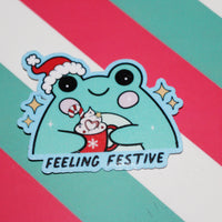 Load image into Gallery viewer, Feeling Festive Cute Frog Sticker - Christmas Frog with Hot Chocolate
