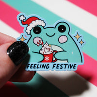 Load image into Gallery viewer, Feeling Festive Cute Frog Sticker - Christmas Frog with Hot Chocolate
