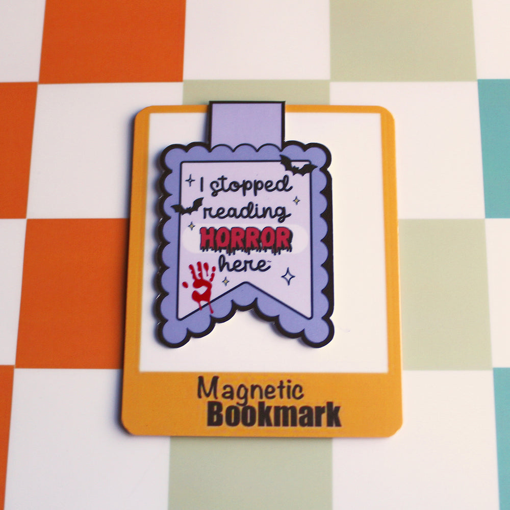 Magnetic bookmark with text on a checkered background
