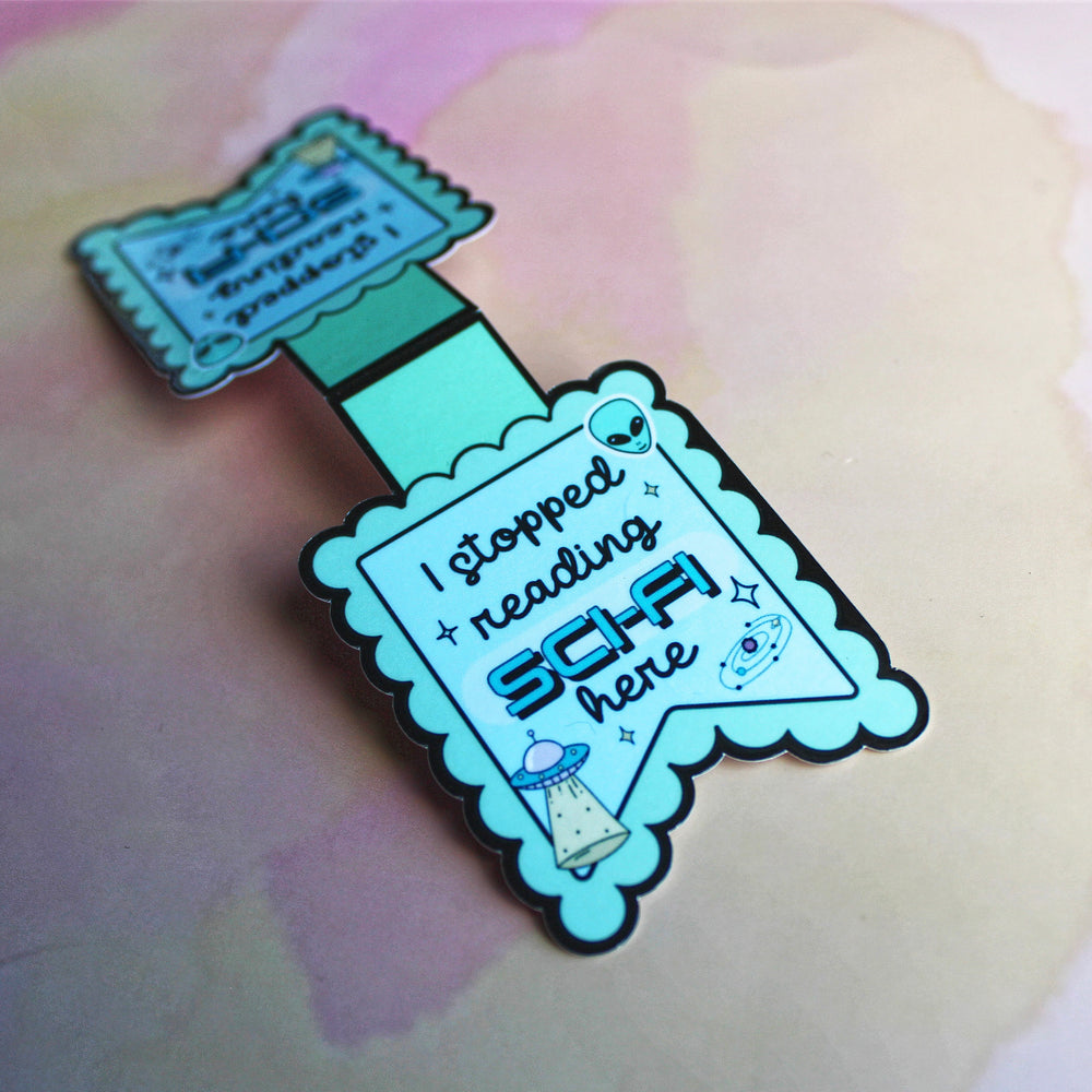 Bookmark with 'I stopped reading SCI-FI here' text on a soft pink background