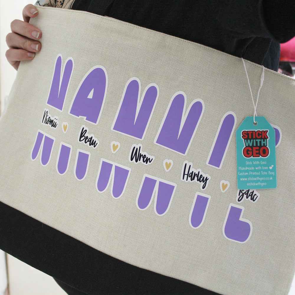 Tote bag with 'NANNIE' and children's names printed on it, held by a person.