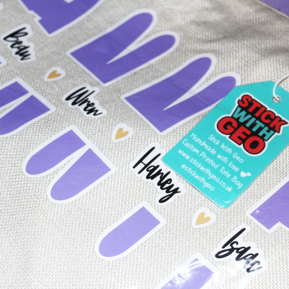 Purple cut-out letters on a white background with a 'Stick with Geo' tag.