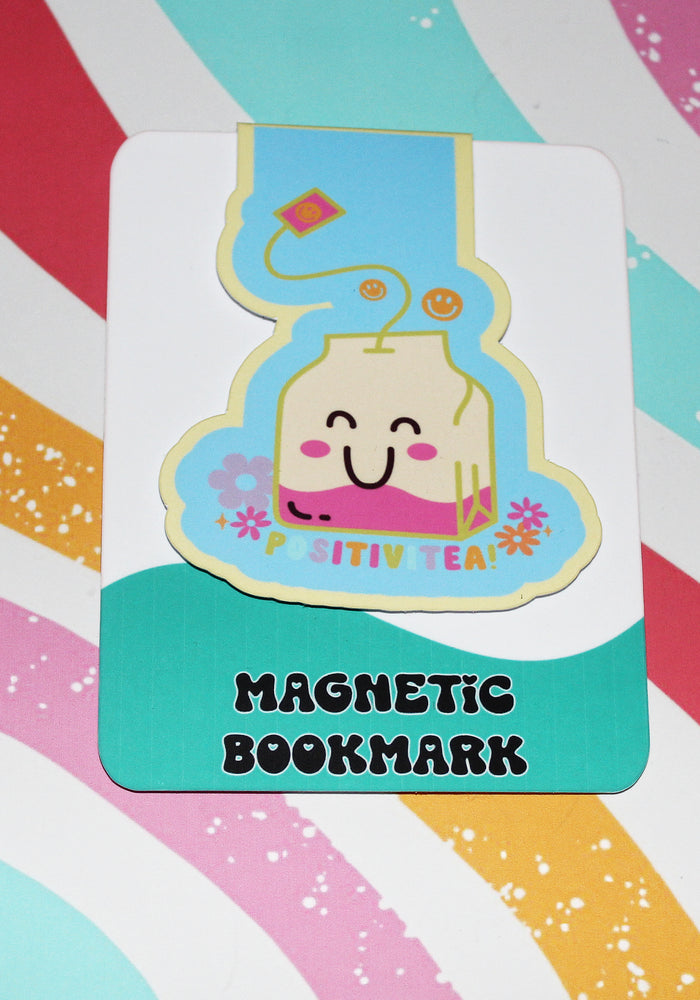 Magnetic bookmark with a cartoon tea bag design on a colorful striped background