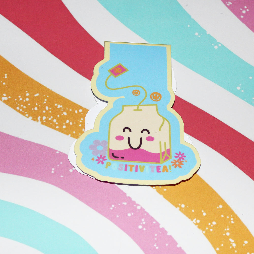 Colourful bookmark of a smiling bottle labeled 'PositiviTea' on a striped background
