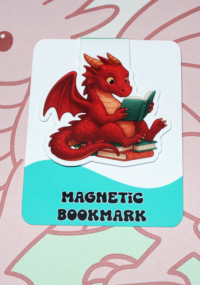 Red dragon magnetic bookmark on a pink and green background