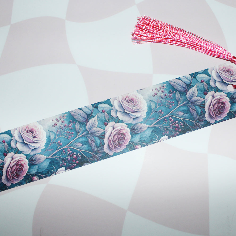 Floral design with pink tassel on a light background