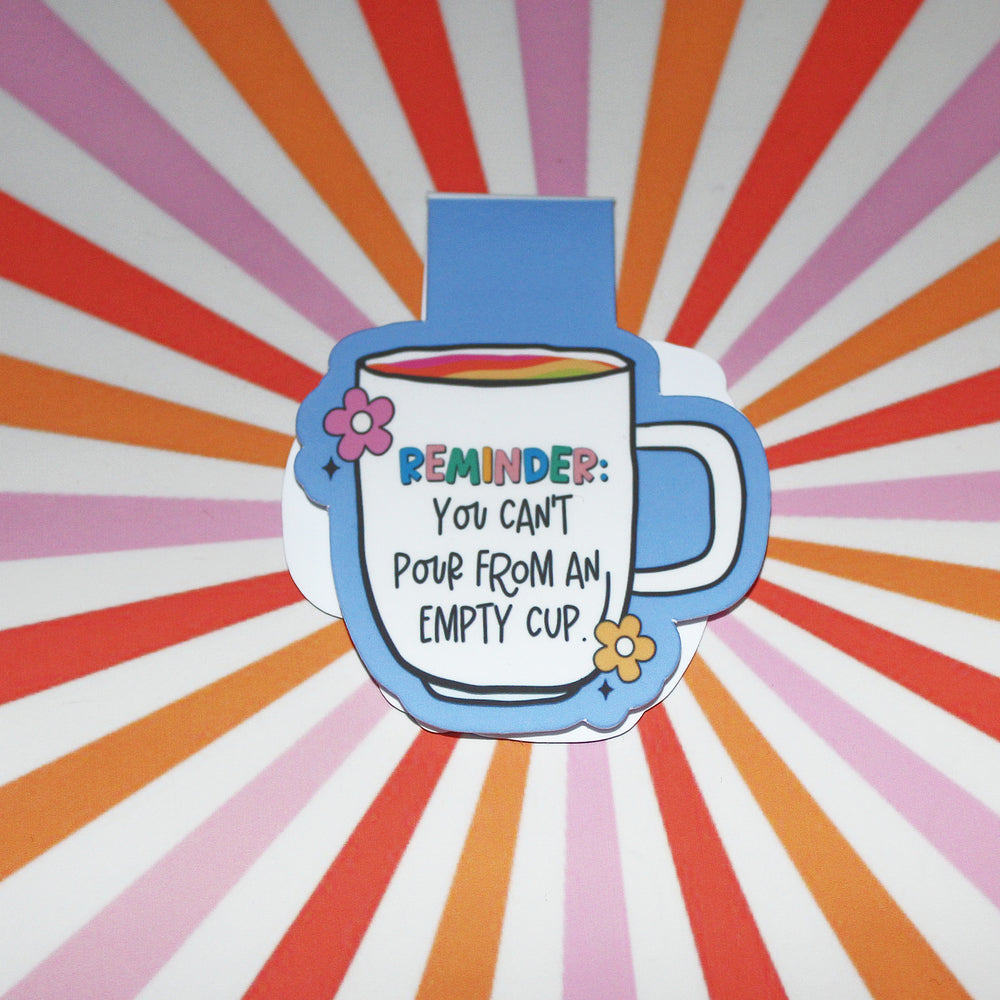 Colourful mug illustration with motivational quote  on a magnetic bookmark - on a sunburst background