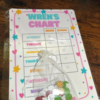 Load image into Gallery viewer, Children's behavior chart with decorative elements on a wooden surface
