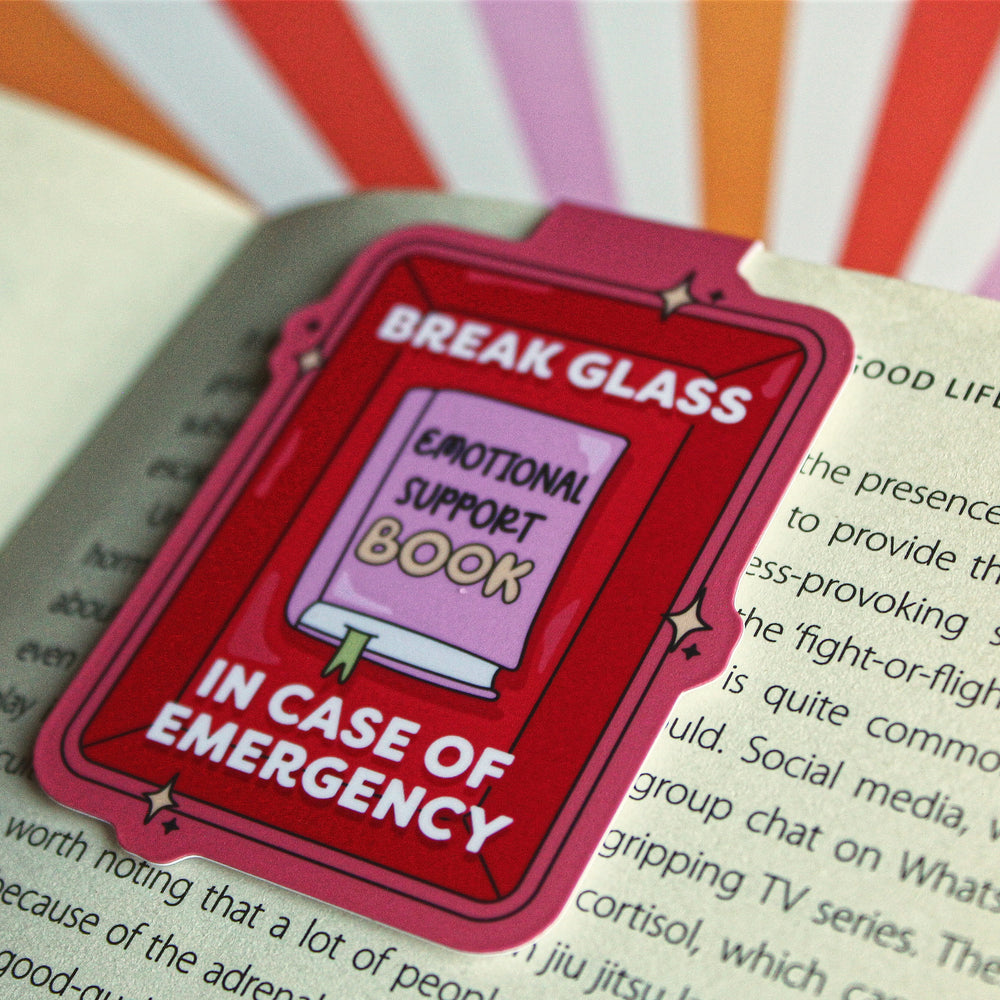 Novelty bookend with 'Break Glass Emotional Support Book' design on a striped background