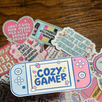 Load image into Gallery viewer, Cozy Gamer Sticker | Cute Gaming Console Vinyl Sticker | Pastel Aesthetic Gamer Gift | Gloss Finish | Stick With Geo
