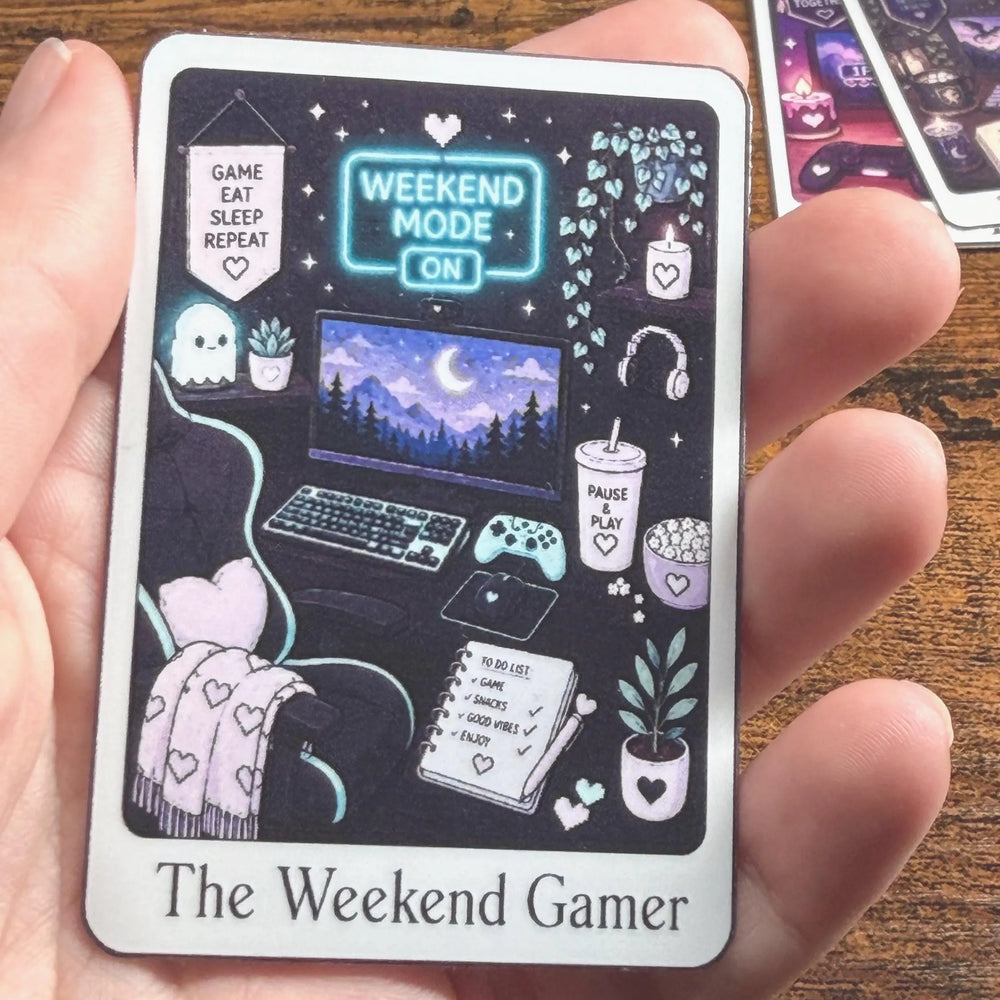 A hand holds a rectangular printed Sticker titled 