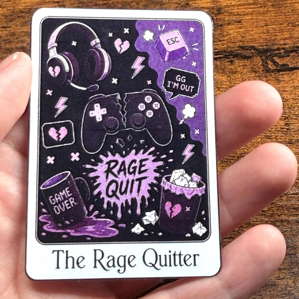 A hand holding a rectangular printed sticker titled 