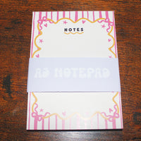 Load image into Gallery viewer, Notebook with decorative cover on a wooden surface
